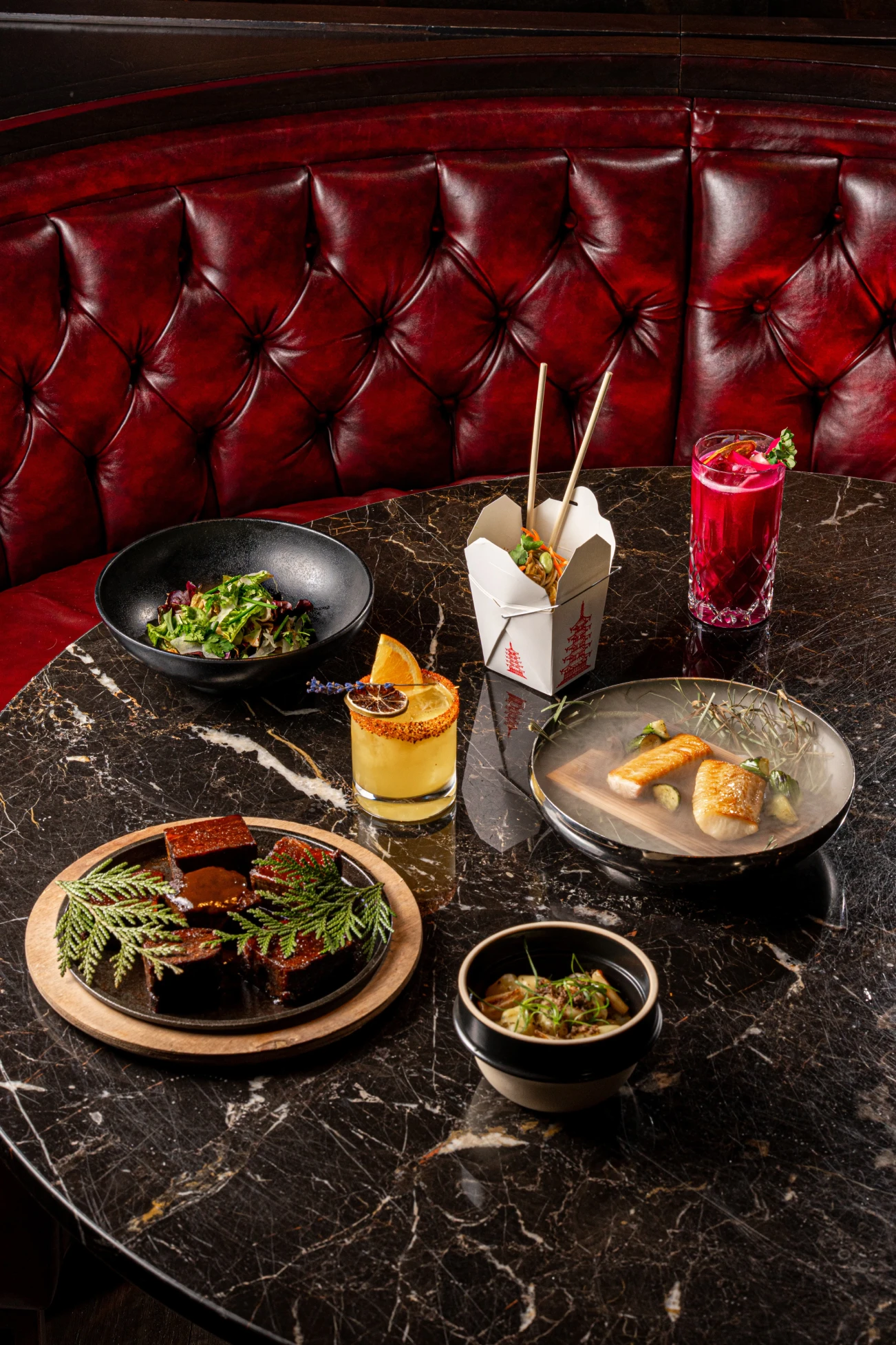 various plates and drinks served at Paradise Club NYC