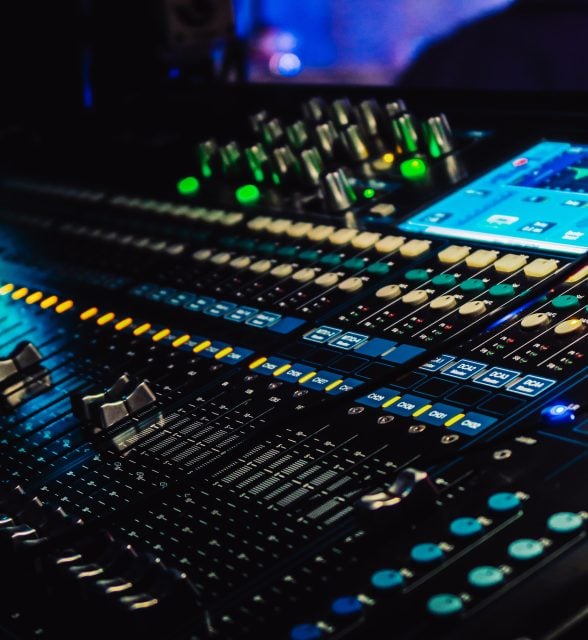 Closeup of an audio mixing control panel