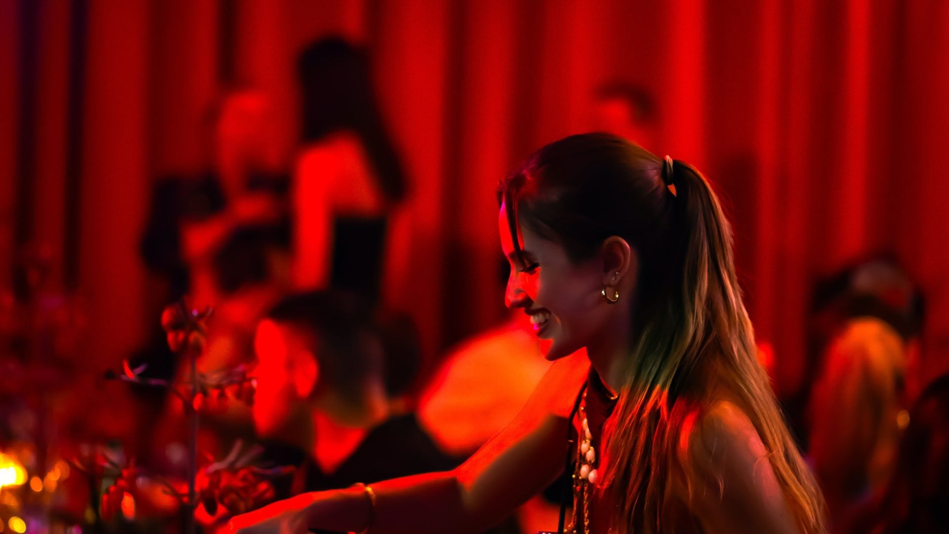 A bartender preparing cocktails at the Paradise Club