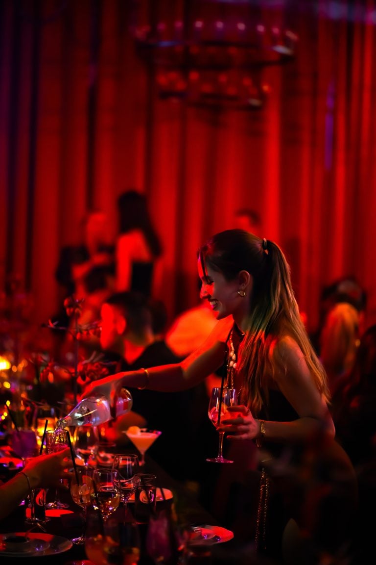 A bartender preparing cocktails at the Paradise Club
