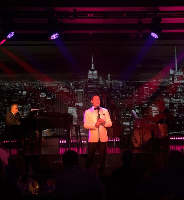 a jazz singer with piano accompanist at the Paradise Club in NYC