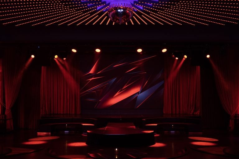 a dark stage at the Paradise Club in NYC