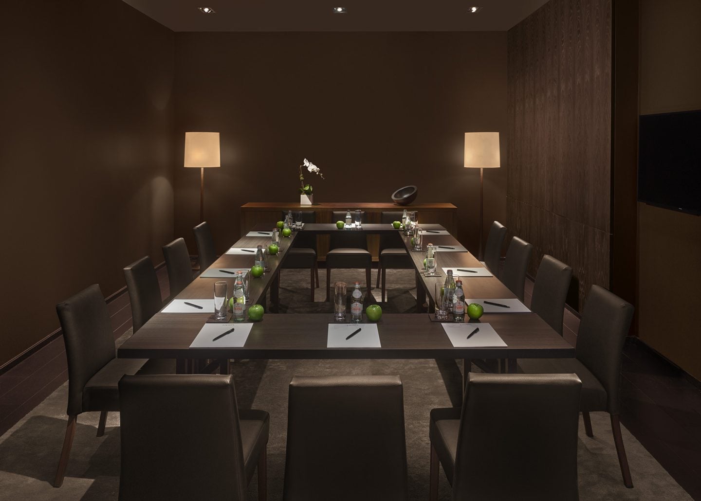 a meeting room with square table
